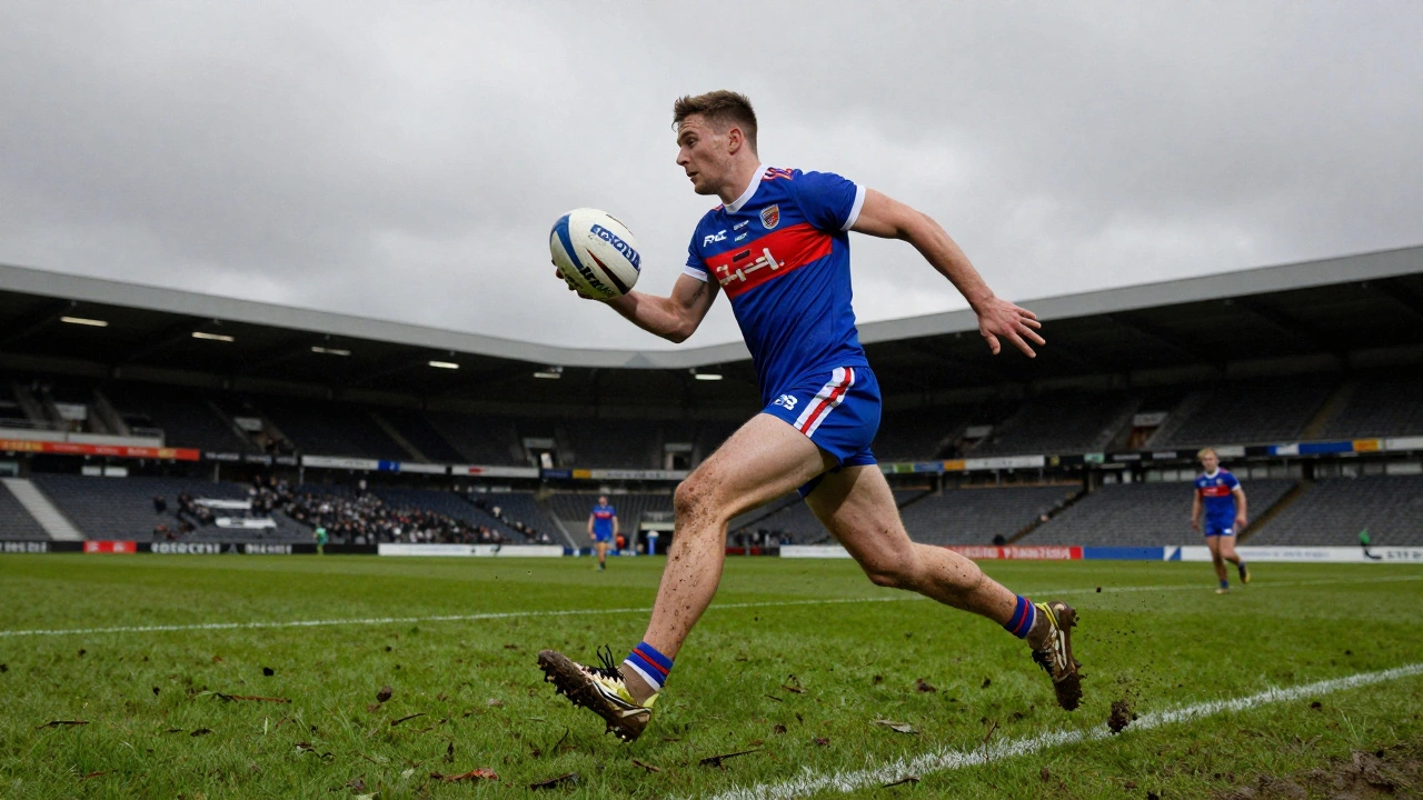 Gaelic football player in technical sportswear on a muddy pitch